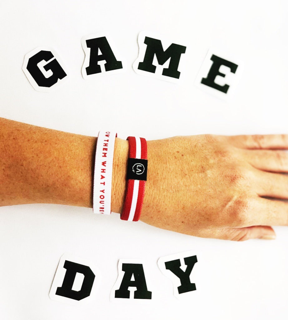 Be your teams number one fan and showcase the best spirit wear at the tailgate when you sport your teams colors on you wrist with this Refocus Band!